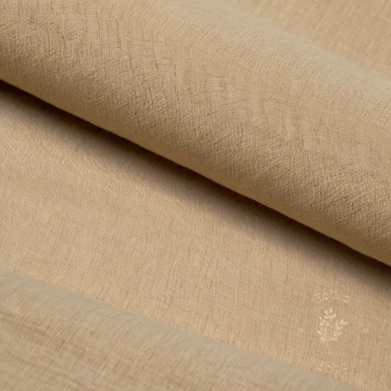 Organic cotton fabric laid flat, highlighting its texture contrast.