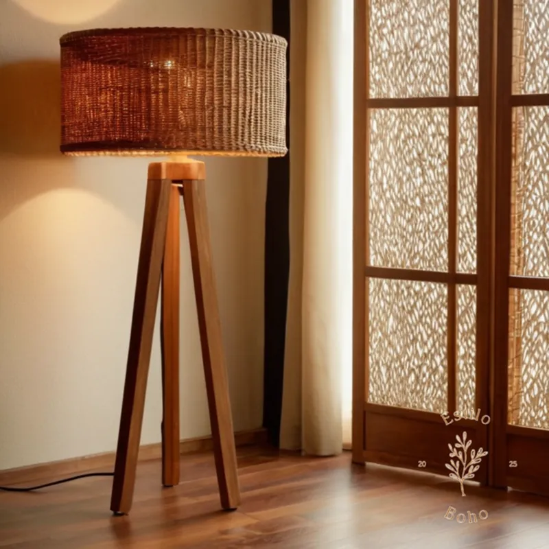A wooden floor lamp with wicker natural screen.
