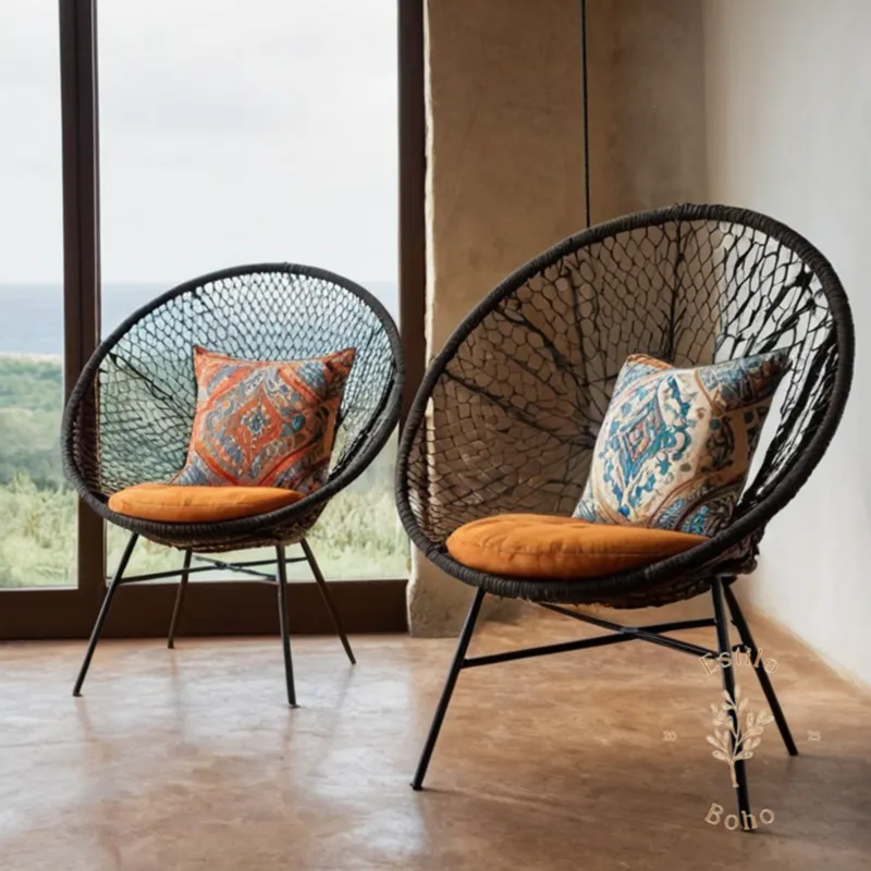3-boho chic chairs made from metal and rope.